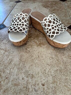 Tory Burch Cream Laser-Cut Slide Mules with Gold Logo